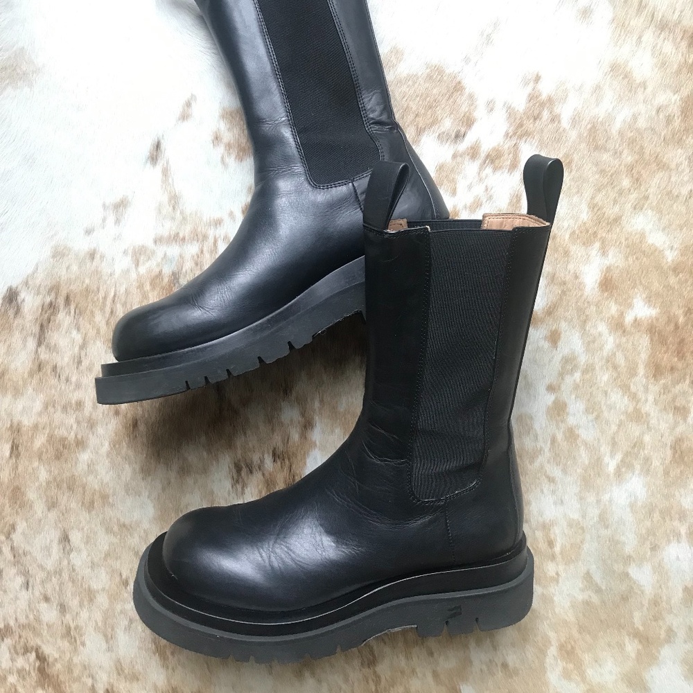 Black leather LUG boots in the style of Bottega Veneta